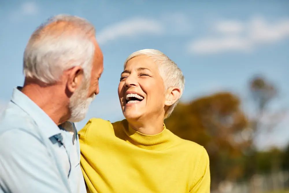 Couple enjoying retirement by the lake